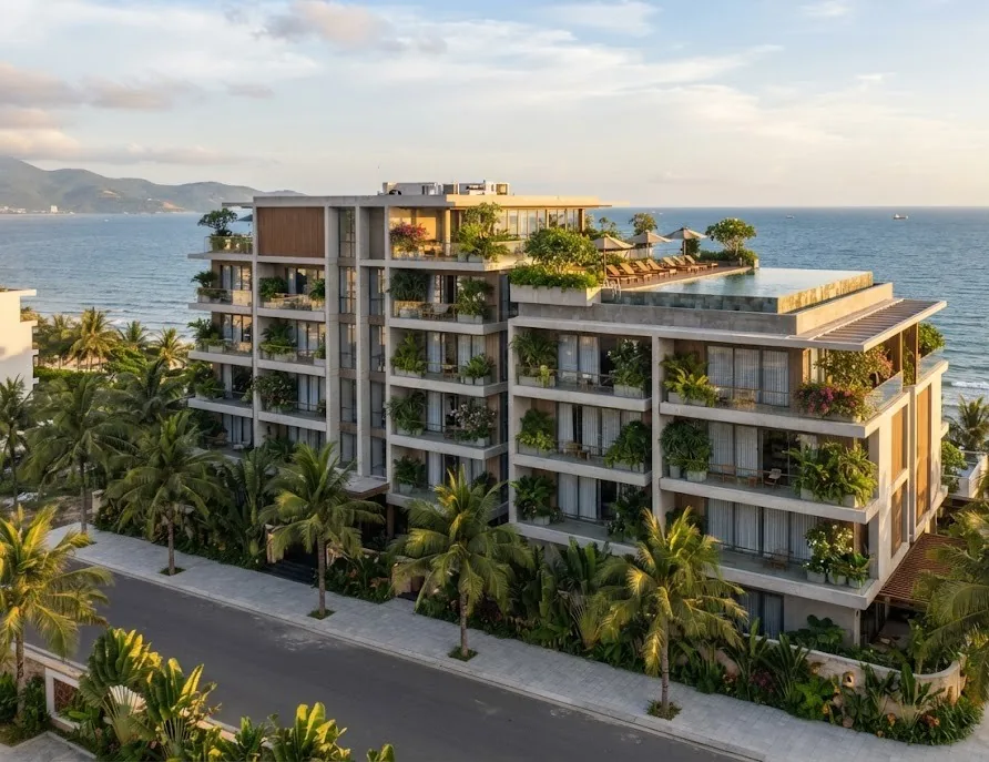 Modern aparthotel building with green balconies and a rooftop pool by the sea