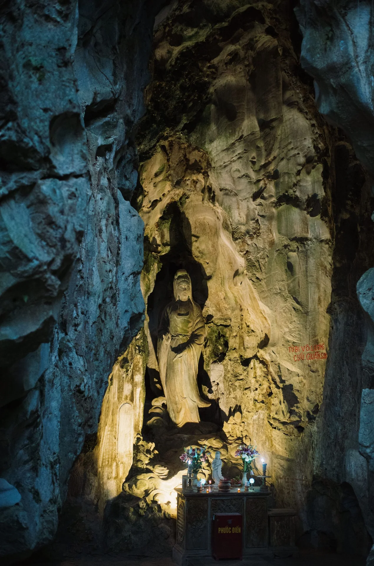 Buddha shrine inside a Marble Mountains cave in Da Nang