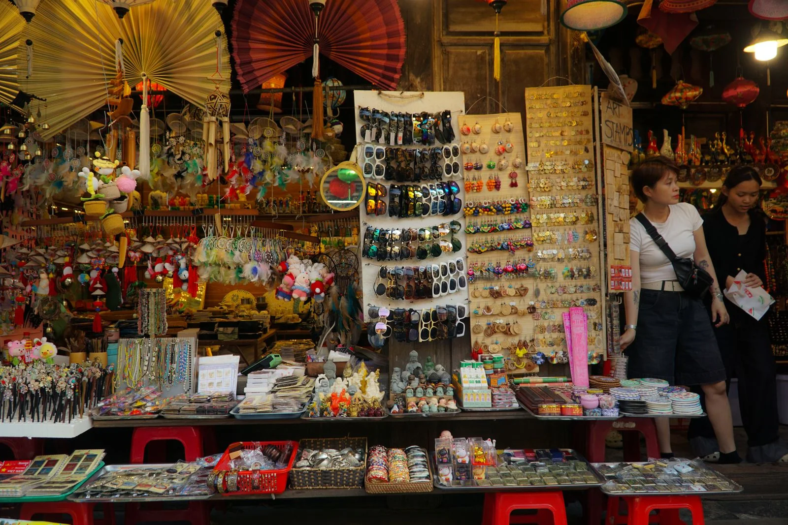 Market stall in Da Nang selling souvenirs, fans and accessories