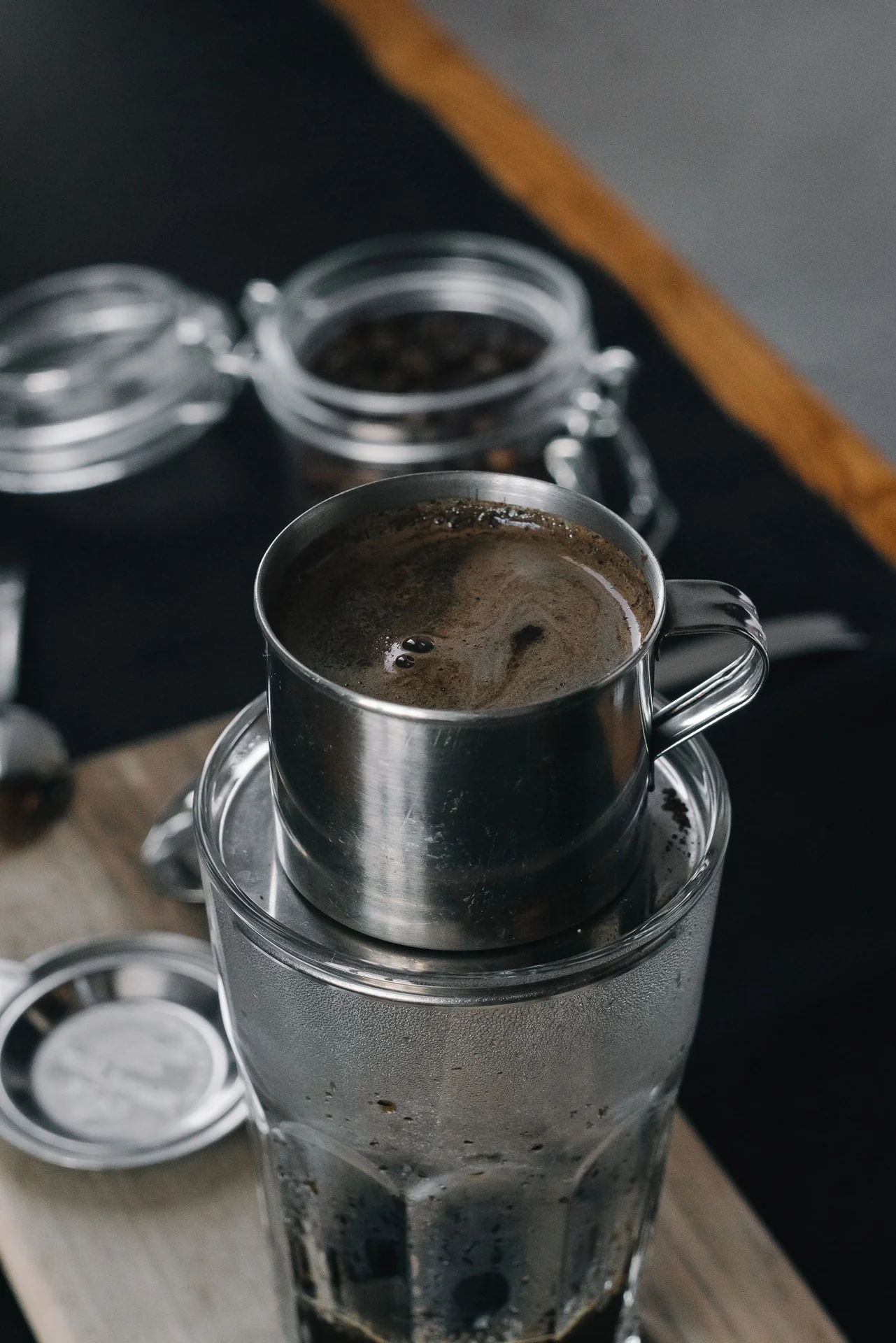 Vietnamese coffee dripping through a phin filter
