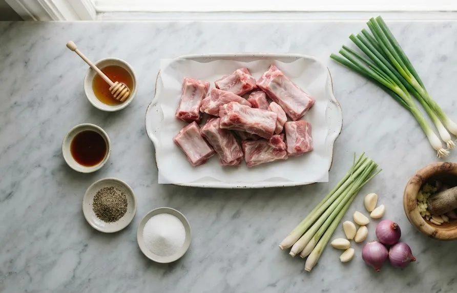 Flat lay of pork ribs with lemongrass, garlic, shallots, honey and fish sauce